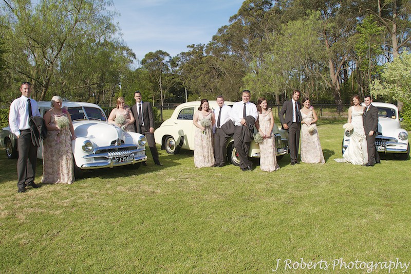 Bridal party with FJ Holden wedding cars - wedding photography sydney